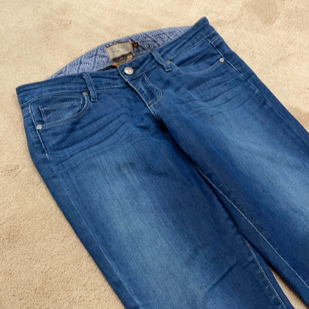 Blue denim,soft,skinny jeans. Cropped ankle length, patch pockets in back.